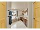 Large bathroom with a soaking tub, double sinks and vanity with tile flooring at 6201 Rain Dance Trl, Littleton, CO 80125
