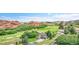 Beautiful house with a mature landscape and stunning views of mountains and the surrounding terrain at 6201 Rain Dance Trl, Littleton, CO 80125