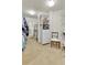Large walk-in closet featuring custom shelving and ample storage space for organization at 6201 Rain Dance Trl, Littleton, CO 80125