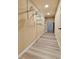 Long walk-in closet with custom shelving and safe at 6201 Rain Dance Trl, Littleton, CO 80125