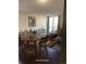Bright living room featuring large windows, hardwood floors, and contemporary furnishings at 2500 S York St # 401, Denver, CO 80210