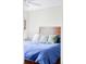 Well lit bedroom with neutral walls, plush bedding, and comfortable atmosphere at 10422 Nelson Ct, Broomfield, CO 80021
