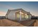 Picture of the rear of a home featuring a covered patio with recessed lighting, perfect for outdoor living at 9688 Winterset Cir, Littleton, CO 80125