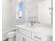 Well-lit bathroom features a vanity, modern fixtures, and a shower/tub combo at 9688 Winterset Cir, Littleton, CO 80125