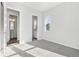 Open bedroom boasts an ensuite bathroom and plenty of natural light at 9688 Winterset Cir, Littleton, CO 80125