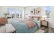Stylishly furnished bedroom with large windows and comfortable bedding at 9688 Winterset Cir, Littleton, CO 80125