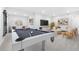 Bright game room with a pool table, contemporary furnishings, and neutral decor, perfect for entertaining at 9688 Winterset Cir, Littleton, CO 80125