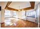 Bright dining room featuring hardwood floors and a chandelier at 12015 W 56Th Dr, Arvada, CO 80002