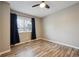 Inviting bedroom featuring a ceiling fan, vinyl floors and natural light at 7995 E Mississippi Ave # 24, Denver, CO 80247