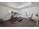 Well-equipped fitness center with treadmill, elliptical machine, and weight-lifting equipment at 7995 E Mississippi Ave # 24, Denver, CO 80247