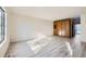 Bright living room with wood-look floors and built-in storage at 61 S Sable Blvd # C14, Aurora, CO 80012