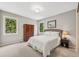 Cozy bedroom with neutral tones, natural light, and ample space at 30866 Kings Valley Way, Conifer, CO 80433