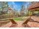 Backyard with chairs, grass and patio at 12718 W 84Th Dr, Arvada, CO 80005