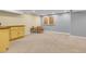Finished basement featuring plush carpeting, recessed lighting, and a sitting area at 12718 W 84Th Dr, Arvada, CO 80005