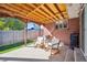Comfortable covered patio with seating area and grill, perfect for outdoor entertaining at 7910 Hooker St, Westminster, CO 80030
