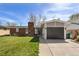 Beautiful single-Gathering home featuring a brick facade and attached garage at 7910 Hooker St, Westminster, CO 80030