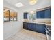 Bright kitchen featuring sleek appliances, white tile backsplash, and windows for natural light at 7910 Hooker St, Westminster, CO 80030