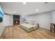 Cozy living room with tile floors, a sectional sofa, and a stone fireplace at 7910 Hooker St, Westminster, CO 80030