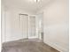 Bright bedroom with neutral carpet and white trim throughout at 1340 Iola St, Aurora, CO 80010