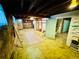 Unfinished basement area featuring a concrete floor ready for customization and storage at 767 S York St, Denver, CO 80209