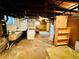 Functional basement area including laundry setup and utility sink, ready for updates at 767 S York St, Denver, CO 80209