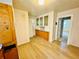Vintage kitchen with built-in cabinets and vinyl flooring, ready for renovation at 767 S York St, Denver, CO 80209