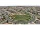 Aerial view of a Gathering-friendly neighborhood with a central park and well-maintained streets at 10597 Soulmark Way, Highlands Ranch, CO 80126