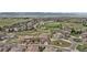 Aerial view showcases the home's location near community amenities and scenic surroundings at 10597 Soulmark Way, Highlands Ranch, CO 80126