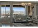 Inviting living room with views of the snow-capped mountains and contemporary décor at 10597 Soulmark Way, Highlands Ranch, CO 80126