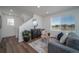 Cozy living room with neutral decor, ample natural light, and stylish furnishings at 13545 E 103Rd Ave, Commerce City, CO 80022