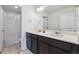 Modern bathroom with double sinks and spacious vanity at 7498 E 157Th Pl, Thornton, CO 80602