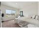 Comfortable bedroom with a view, and a queen sized bed at 7498 E 157Th Pl, Thornton, CO 80602