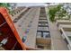 Low angle view of multi-story building with balconies and views at 2 Adams St # 809, Denver, CO 80206