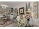 Dining area with glass table, black and white chairs, and eclectic decor at 2 Adams St # 809, Denver, CO 80206