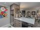 Kitchen featuring stainless steel refrigerator, stone countertops, and a view to the dining area at 2 Adams St # 809, Denver, CO 80206