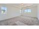 Spacious bedroom features tray ceiling, plush carpet and an abundance of natural light at 1280 S Algonquian St, Aurora, CO 80018