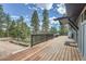 Spacious back deck with plenty of room to grill, relax and take in nature at 28669 Mountain View Rd, Conifer, CO 80433