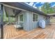 Back deck features patio furniture, a grill, and outdoor space at 28669 Mountain View Rd, Conifer, CO 80433
