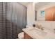 Clean bathroom with a shower-tub combo with a modern vanity and fixtures at 28669 Mountain View Rd, Conifer, CO 80433