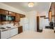 Bright kitchen features modern countertops, wooden cabinets, and stainless appliances at 28669 Mountain View Rd, Conifer, CO 80433