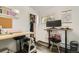 Bright home office with a closet, desk, and large window with scenic views at 28669 Mountain View Rd, Conifer, CO 80433