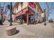 Commercial brick building with inviting street view; signage, street lamps, and sidewalk seating offer a lively atmosphere at 2845 Quitman St, Denver, CO 80212