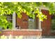 Charming brick home featuring a classic front door and address plaque at 2845 Quitman St, Denver, CO 80212