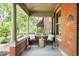 Cozy front porch featuring comfortable seating and classic architectural details at 2845 Quitman St, Denver, CO 80212