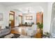 Bright and open living room with hardwood floors and exposed brick at 2845 Quitman St, Denver, CO 80212