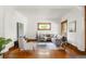 Spacious living room featuring hardwood floors and a comfortable seating area at 2845 Quitman St, Denver, CO 80212