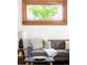 Cozy living room featuring a stylish sofa and decorative window at 2845 Quitman St, Denver, CO 80212