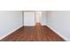 Hallway features hardwood floors, multiple closets, and is freshly painted at 969 S Pearl St # 305, Denver, CO 80209