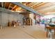 Unfinished basement with exposed ceiling and a set of stairs at 2455 Alpine St, Longmont, CO 80504