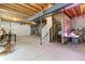 Unfinished basement with exposed ceiling and concrete floor at 2455 Alpine St, Longmont, CO 80504